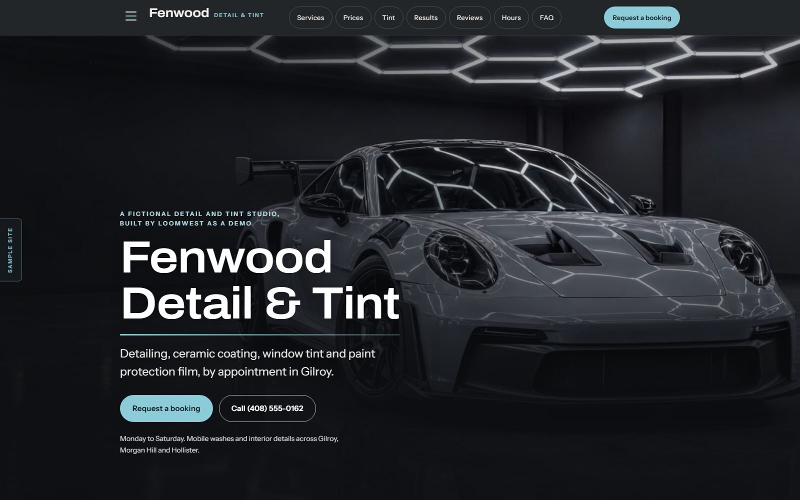 Fenwood Detail & Tint, a fictional detail and tint studio demo: a grey sports car under hexagonal shop lights