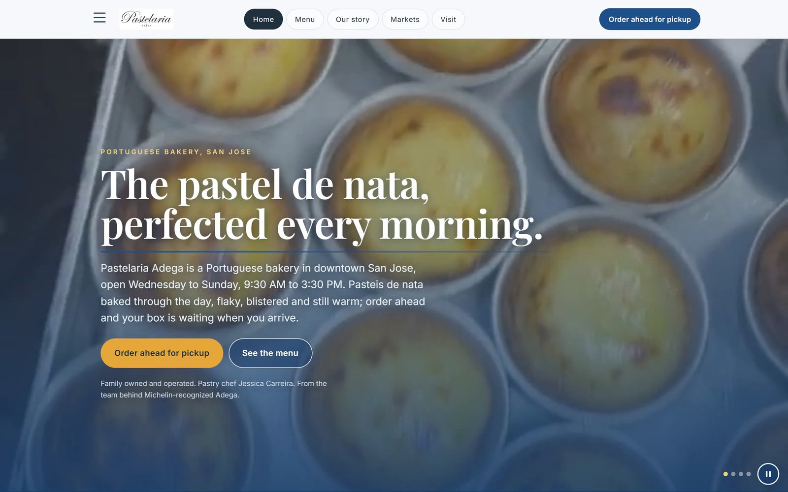 The Pastelaria Adega home page on a desktop, where the film starts before it opens the markets page