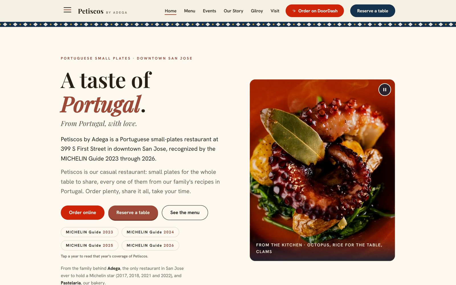 The Petiscos by Adega home page on a desktop, where the film starts before it opens the story page