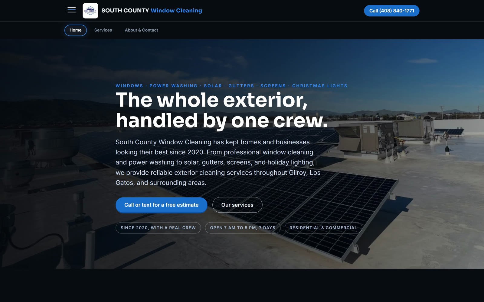 The South County Window Cleaning home page on a desktop: the headline The whole exterior, handled by one crew, the list of services, Call or text for a free estimate and Our services buttons, and a rooftop of solar panels behind