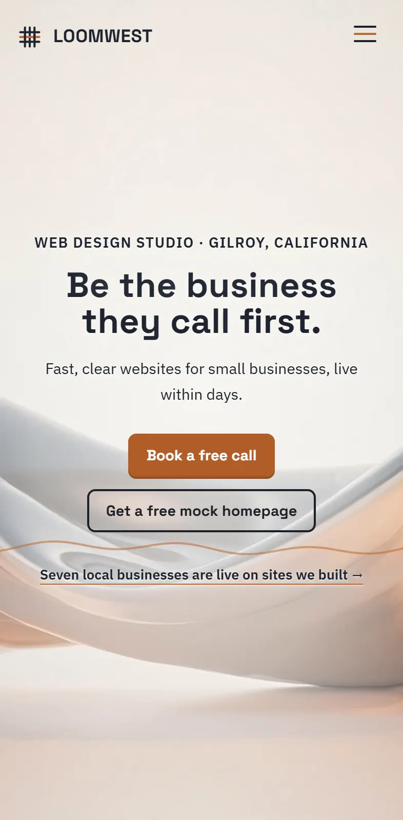 After: the Loomwest home page today on a phone, first screen: Be the business they call first., one line on what we build, Book a free call, Get a free mock homepage and a link to the seven live sites